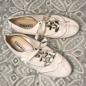 Thrifted oxford style shoes